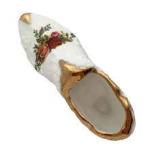 Load image into Gallery viewer, Vintage Old Country Roses bone china shoe features deep pink and yellow roses with gold gilt details. Crafted by Royal Albert, England, 1941 to 1998. A lovely addition to your china collection!
In excellent condition, no chips/cracks/repairs.
Measures 4 1/2 x 1 1/2 x 2 inches