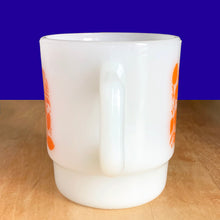 Load image into Gallery viewer, Handle view of vintage Fire-King milk glass mug with orange rose pattern and handle, Anchor Hocking USA