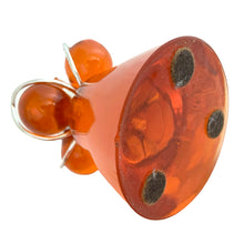 Load image into Gallery viewer, Detail view of base of vintage mid-century orange lucite candle holder showing chip at the bottom edge