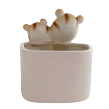 Load image into Gallery viewer, Kitschy vintage mid-century ceramic planter featuring an orange tabby cat couple. Crafted by Inarco, Japan, circa 1950s. In excellent condition, free from chips/cracks/repairs. Marked on the base with Inarco's logo and "E-3259". Measures 4 7/8 x 4 x 5 1/2 inches