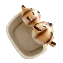 Load image into Gallery viewer, Kitschy vintage mid-century ceramic planter featuring an orange tabby cat couple. Crafted by Inarco, Japan, circa 1950s. In excellent condition, free from chips/cracks/repairs. Marked on the base with Inarco's logo and "E-3259". Measures 4 7/8 x 4 x 5 1/2 inches