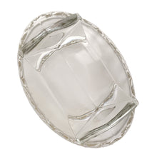 Load image into Gallery viewer, This exquisite vintage flowerlite features a clear oblong shape adorned with a delicate silver overlay of orchid flowers. Crafted by Viking Art Glass in the 1950s, it includes a glass flower frog designed to hold two taper candles and rests on elegant Chinoiserie-style scrolled feet. Ideal for creating sophisticated floral arrangements, this Hollywood Regency piece enhances any space with timeless charm, whether illuminated by candlelight or displayed on its own in both modern and vintage interiors.