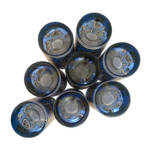 Load image into Gallery viewer, Bottom view of 22kt gold Paisley pattern on royal blue Culver glass tumblers