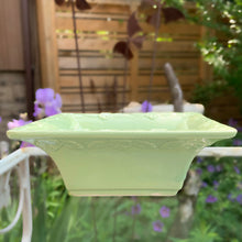 Load image into Gallery viewer, Vintage pale green square ceramic jardiniere planter No 322-6 featuring flared edge embossed with florals. Crafted by Robinson Ransbottom Pottery Co., 1950s. A beautiful piece to add to your art pottery collection!
In good vintage condition, no chips/cracks/repairs. Age-related crazing and manufacturer's glaze pops. Maker's marks.
Measures 6 x 6 x 2 1/4 inches