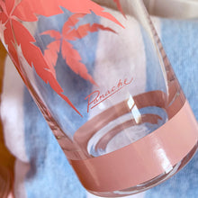 Load image into Gallery viewer, The tropical graphics are the standout feature of these vintage mid-century Panache highball glass tumblers decorated with pink palm trees against a beautiful sunset. Designed by Wolly Clark, circa 1950s. These glasses will definitely add some sweet beachy vibes to your cocktails!  These glasses are in like-new condition, free from chips/cracks/dishwasher damage.  Measures 2 1/2 x 6 1/2 inches  Capacity 13 1/2 ounces
