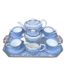 Load image into Gallery viewer, Stunning antique bone china tea set features the Persian pattern in blue florals on white bone china with gold gilt details. Crafted by William Alsager Adderley, WAA & Co., and manufactured at the Daisy Bank Pottery, Longton, Stoke-on-Trent, England, between 1886 - 1905. A stunning groups of bone and opaline china.
Open stock, teapot, covered sugar, creamer set, tray and four cup and saucer sets (two sets are imperfect)