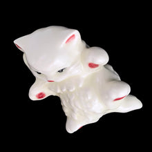 Load image into Gallery viewer, Overhead view of ceramic white persian cat figurine with pink paws