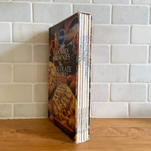 Load image into Gallery viewer, Pillsbury is known for its fabulous products and recipes. This collection of softcover cookbooks focuses on their Cookies, Brownies and Chocolate in 5 mini cookbooks featuring recipes along with tons of colour photographs. Originally published in 1987 by Pillsbury and reprinted in this 1997 edition by Ottenheimer Publishers, USA. Get baking! In great vintage condition with normal age-related yellowing.