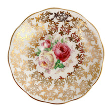 Load image into Gallery viewer, Traditional vintage mid-century era Avon shaped teacup and saucer featuring hand painted pink cabbage roses and heavy gold filigree pattern of flowers on the cup and saucer interiors with gently scalloped gold gilt rims. Crafted by Royal Albert, England, circa 1950s. A beautiful gift or addition to your collection!