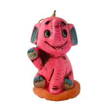 Load image into Gallery viewer, Adorable vintage Little Pal Sachet ceramic fluorescent pink elephant figurine atop a salmon coloured powder puff with string for ease of hanging. Crafted by Celebrity, Japan, 1970s. A sweet bit of retro style to add to your decor! In like new condition in original plastic cylinder package. New old stock. Product is scented. Measures 2 1/2 x 3 3/4 inches