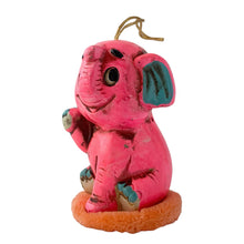Load image into Gallery viewer, Adorable vintage Little Pal Sachet ceramic fluorescent pink elephant figurine atop a salmon coloured powder puff with string for ease of hanging. Crafted by Celebrity, Japan, 1970s. A sweet bit of retro style to add to your decor! In like new condition in original plastic cylinder package. New old stock. Product is scented. Measures 2 1/2 x 3 3/4 inches