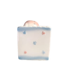 Load image into Gallery viewer, Adorable kitschy pink elephant pulling a wagon nursery planter. Crafted by Rubens Originals, Japan, 1950s. A sweet addition for your new addition. Use for tiny plants or repurpose to hold baby accessories.
In excellent as found vintage condition, no chips/cracks/repairs, normal crazing present.
Measures 6 1/2 x 2 1/2 x 3 1/2 inches