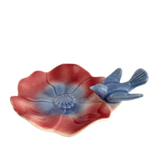Load image into Gallery viewer, Vintage ceramic trinket dish features a figural pink and blue poppy flower with a bluebird perched on the scalloped rim. Crafted by the Royal Copley, USA, 1939 - 1960. Perfect for trinkets or use as a soap dish.
In excellent condition, free from chips/cracks/repairs.
Measures 5 3/4 x 5 3/4 inches