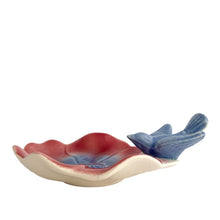 Load image into Gallery viewer, Vintage ceramic trinket dish features a figural pink and blue poppy flower with a bluebird perched on the scalloped rim. Crafted by the Royal Copley, USA, 1939 - 1960. Perfect for trinkets or use as a soap dish.
In excellent condition, free from chips/cracks/repairs.
Measures 5 3/4 x 5 3/4 inches