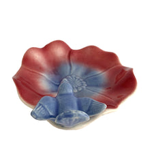 Load image into Gallery viewer, Vintage ceramic trinket dish features a figural pink and blue poppy flower with a bluebird perched on the scalloped rim. Crafted by the Royal Copley, USA, 1939 - 1960. Perfect for trinkets or use as a soap dish.
In excellent condition, free from chips/cracks/repairs.
Measures 5 3/4 x 5 3/4 inches