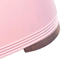 Load image into Gallery viewer, Gold-tone metal trim foot and ribbed detail on vintage mid-century pink hamper