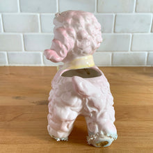 Load image into Gallery viewer, Adorable mid-century hand painted ceramic anthropomorphic happy lamb planter (4318) in pink with a yellow bow with spaghetti details. Produced by Relpo, Japan, 1961 for Samson Imports. The epitome of kitschy nursery decor and a great little vessel for a houseplant, succulent or to hold baby accessories. In excellent condition, no chips/cracks/repairs. Marked on the bottom, ©Samson Import Co. 1961, 4318". Measures 5 x 3 1/2 x 5 5/8 inches