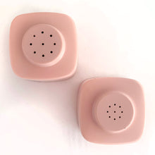 Load image into Gallery viewer, A fabulous retro pair of vintage pink melamine square salt and pepper shakers. Designed by Joan Luntz for the International Molding Company who made the mid-century modern Brookpark melamine, circa 1950. In excellent condition, free from chips/cracks with original stoppers (pepper stopper is discoloured from use). Measures 1-7/8" x 1-7/8" x 1-7/8"