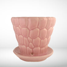 Load image into Gallery viewer, Striking vintage gloss pink pebble planter pot with attached saucer. Crafted by McCoy Pottery, 1950s. This planter is must for any McCoy art pottery collector!
In excellent vintage condition, no chips or cracks, crazing present. Marked 303 and 6 on the bottom.
Measures 6 1/4 x 5 1/2 inches