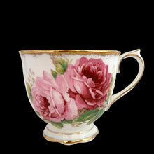 Load image into Gallery viewer, This vintage American Beauty bone china teacup and saucer is so pretty! Both the Countess shaped cup and saucer have a lovely scalloped edge with hand painted roses in shades of pink and green with gold gilt rim. Crafted by Royal Albert, England, 1941 to 1998. A lovely addition to your teacup collection or to give as a gift!
In excellent condition, free from chips, cracks and repairs. Makers marks present.
Teacup measures 3 1/4 x 2 3/4 inches. Saucer measures 5 1/2 inches
