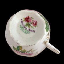 Load image into Gallery viewer, This vintage American Beauty bone china teacup and saucer is so pretty! Both the Countess shaped cup and saucer have a lovely scalloped edge with hand painted roses in shades of pink and green with gold gilt rim. Crafted by Royal Albert, England, 1941 to 1998. A lovely addition to your teacup collection or to give as a gift!
In excellent condition, free from chips, cracks and repairs. Makers marks present.
Teacup measures 3 1/4 x 2 3/4 inches. Saucer measures 5 1/2 inches