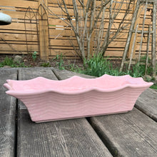 Load image into Gallery viewer, Vintage Art Deco style pink speckled rectangular stoneware planter featuring a wave pattern and flared scalloped edge. Crafted by Hull Pottery, circa 1950s. Your succulents new home!
In good vintage condition, chip to one of the points, no cracks.
Measures 12 1/8 x 4 1/2 x 3 inches