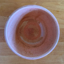 Load image into Gallery viewer, Vintage pink speckled horizontal ribbed ceramic ovenware mixing bowl. Crafted by McCoy Pottery, 1950s. A rare piece to add to your art pottery collection!
In excellent condition, no chips/cracks/repairs. Age-related crazing and wear. Typical manufacturing glaze pops. Maker's marks.
Measures 5 x 2 3/4 inches