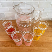 Load image into Gallery viewer, Glassware dreams are made of these beauties! This is a fantastic set of six vintage mid-century beverage glasses decorated in pairs with a pink, yellow or red basketweave pattern topped with a band of white ivy. Produced by Federal Glass, circa 1950s. The perfect addition to any style vintage kitchen and your tablescape will thank you! In like new condition, free from chips/wear. The paint is vibrant and shiny. Unmarked. Measures 2 1/2 x 4 1/2 inches Capacity 12 ounces