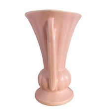 Load image into Gallery viewer, Beautiful vintage matte pink classically shaped handled trumpet vase. Crafted by McCoy Pottery, 1940s. This vase is must for any art pottery collector!
In excellent vintage condition, no chips, no cracks, no repairs. Maker's mark on the bottom.
Measures 6 1/4 x 9 1/4 inches