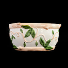 Load image into Gallery viewer, This vintage white ceramic planter is decorated with pink and green raised ivy design. Produced by Claire Burke, Taiwan, circa 1970s. In excellent condition, free from chips/cracks/repairs. Marked "Claire Burke Ti" on the bottom with Made in Taiwan sticker. Measures 7 1/4 x 4 3/8 x 3 1/2 inches