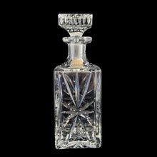 Load image into Gallery viewer, Vintage cut crystal liquor square decanter featuring a pattern of pinwheels and starbursts. Crafted in Germany, circa 1950s. Add this eye catching crystal to your bar cart!
In excellent condition, no chips. Minor wear to the stopper's end. Original sticker.
Measures 3 x 3 x 8 3/4 inches
Capacity 1 pint or 500ml