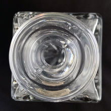 Load image into Gallery viewer, Vintage cut crystal liquor square decanter featuring a pattern of pinwheels and starbursts. Crafted in Germany, circa 1950s. Add this eye catching crystal to your bar cart!
In excellent condition, no chips. Minor wear to the stopper's end. Original sticker.
Measures 3 x 3 x 8 3/4 inches
Capacity 1 pint or 500ml