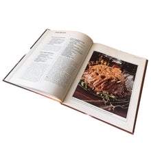 Load image into Gallery viewer, Better Homes and Gardens is known for its fabulous cookbooks. This hardcover cookbook focuses on Pork, Sausage & Ham recipes. Its 96 pages are filled with amazing recipes along with many colour photographs. Originally published by Meredith Corporation, USA, 1979. This is the first edition, forth printing, 1981.
In great vintage condition.