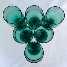 Load image into Gallery viewer, Group of Libbey Premiere dark green goblets viewed from above, showing the circular rims and consistent colour across the set of 8