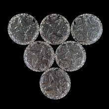 Load image into Gallery viewer, Bottom view of the coaster showing the intricate geometric pressed glass detail.