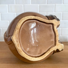 Load image into Gallery viewer, Adorable vintage, mid-century era anthropomorphic ceramic rabbit cookie jar. Crafted by Royal Sealy, Japan, 1950s. A delightful addition to your cookie jar collection and kitchen decor!
In as found vintage condition, with 2 chips to the rim of the lid and a well executed repair to one ear, see photos. No cracks and typical age-related crazing.
Measures 6 x 7 1/4 x 13 1/4 inches