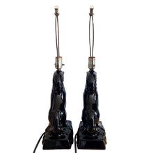 Load image into Gallery viewer, Fabulous pair of vintage rearing black horse ceramic table lamps with brass harps and clear glass marble finials. 1960 or 1970s era judging by the cords and straight pronged plug. These lamps bring all the retro vibes to your home decor!
Both lamps are in excellent condition, no chips/cracks/repairs. New felt on the bottom of each lamp.
Measurements: 7 1/2 x 5 x 12 inches (23 1/2 inches to top of finial)
Suitable for a 9 or 10 inch shade