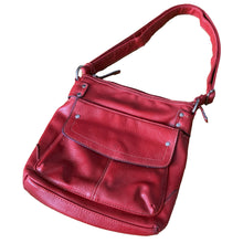 Load image into Gallery viewer, Vintage red faux leather crossbody purse, featuring zippered closure, adjustable strap, snap and zippered exterior pockets, purple interior with one zippered, two open pockets. Crafted by Emilie M.
In excellent vintage condition, see photos.
Measurements with strap 9 x 35 inches
Measurements without strap 9 x 9 3/4 inches