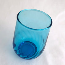 Load image into Gallery viewer, Vintage swirl optic "Regal Laser Blue" 6 ounce flat tumbler glass. Produced by the Anchor Hocking Glass Company, USA, circa 1970s. The colour of these glasses is electric! In excellent condition, free from chips/cracks. Measures 2 1/2 x 3 1/2 inches Capacity 6 ounces. We have 2 in stock, price individually.