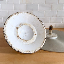 Load image into Gallery viewer, Jacks Daughter of All Trades Vintage Antique Mid-Century Kitsch Store Shop Reseller Etsy Shopify Toronto Canada Free Porch Pick Up Local Delivery Worldwide Shipping Judy Weinberg Unique Sustainable Gift Home Decor Collector Gift Farmhouse Cottagecore Cottage Lodge Shabby Chic Industrial revolving cake stand cast iron base and steel turntable. The base is painted in a putty colour and embossed with the initials JR inside a crown. JR Mahoney for Crown Cookware USA 1930s display old fashioned bakery kitchen