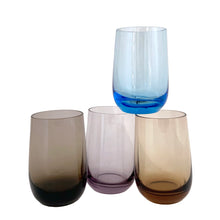 Load image into Gallery viewer, Set of four vintage multi-coloured roly poly juice or cocktail glasses in blue, purple, orange and brown—each one a little burst of retro charm. Perfect for sipping morning juice, mixing craft cocktails, or simply displaying as colourful kitchen décor.
In excellent condition, no chips.
Measures 2 x 3 1/2 inches
Capacity 5 ounces