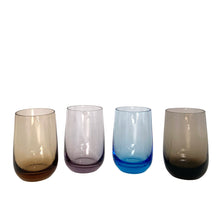 Load image into Gallery viewer, Set of four vintage multi-coloured roly poly juice or cocktail glasses in blue, purple, orange and brown—each one a little burst of retro charm. Perfect for sipping morning juice, mixing craft cocktails, or simply displaying as colourful kitchen décor.
In excellent condition, no chips.
Measures 2 x 3 1/2 inches
Capacity 5 ounces