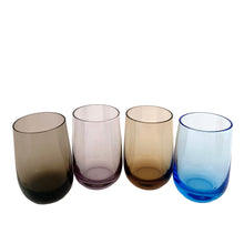 Load image into Gallery viewer, Set of four vintage multi-coloured roly poly juice or cocktail glasses in blue, purple, orange and brown—each one a little burst of retro charm. Perfect for sipping morning juice, mixing craft cocktails, or simply displaying as colourful kitchen décor.
In excellent condition, no chips.
Measures 2 x 3 1/2 inches
Capacity 5 ounces
