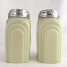 Load image into Gallery viewer, Vintage "Roman Arch" custard uranium glass salt and pepper shaker with the words Salt and Pepper in crisp black script. Produced by McKee Glass, USA, 1930 - 1951. These art deco beauties glow brilliantly under black light and will make a great addition to any vintage kitchen collection!