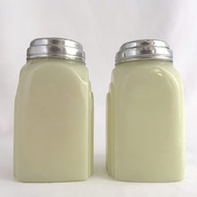 Load image into Gallery viewer, Vintage "Roman Arch" custard uranium glass salt and pepper shaker with the words Salt and Pepper in crisp black script. Produced by McKee Glass, USA, 1930 - 1951. These art deco beauties glow brilliantly under black light and will make a great addition to any vintage kitchen collection!