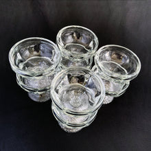 Load image into Gallery viewer, Libbey Glass Company nostalgic clear pressed glass ice cream parlour dishes in stock. They have a quintessential round paneled shape featuring a flared foot impressed basketweave pattern plus the stylized Libbey L on the bottom. Circa 1950s. Perfect for adding a nostalgic touch to desserts - a must-have for all ice cream and dessert lovers! In excellent condition, free from chips/cracks. Measures 3 3/8 x 3 inches. Capacity 4 3/4 ounces