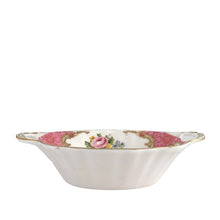 Load image into Gallery viewer, Side view of vintage Lady Carlyle sweetmeat dish displaying elegant gold gilt trim and oval shape