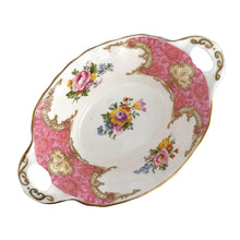 Load image into Gallery viewer, Overhead view of Lady Carlyle bonbon dish showing pink-on-pink floral design and 5.75 inch oval dimensions
