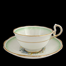 Load image into Gallery viewer, Side view of Royal Albert Set #286 teacup showing green ombré rim and gold gilt trim