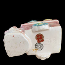 Load image into Gallery viewer, Bottom of vintage Rubens Originals planter showing maker's marks, Shape 1201 stamp, and Made in Japan markings